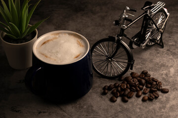 Favorite cup of coffee with a model bicycle