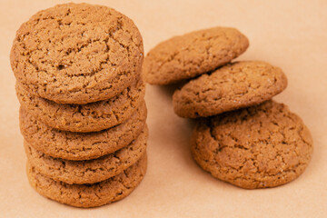 Stack of cookies. Oatmeal cookies on beige background.