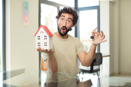 model holding a house. home concept