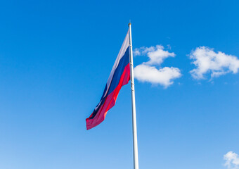 Close up shot of the Russian flag floating on the wind. Country