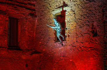 Brest Fortress, Brest, Belarus. A World War II military monument commemorating Soviet resistance to the German invasion. Destroyed buildings are highlighted in red. Night photography