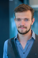 Obraz premium Street portrait of a young handsome man