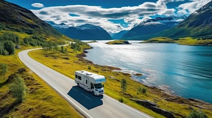 Fotobehang Alpen Modern motorhome driving on road, lake and mountains in background. Generative AI