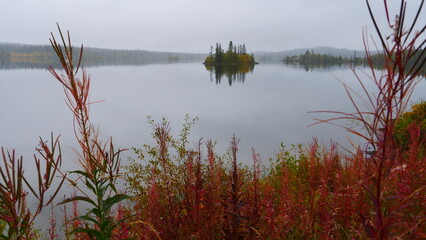small island in the silent lake in Scandinavia