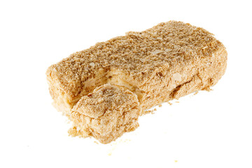 Slice of sweet classic layered cake Napoleon for background. Cake Napoleon isolated on a white background.