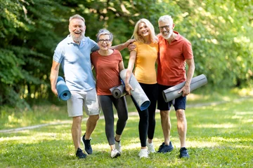 Keuken foto achterwand Oude deur Active Lifestyle. Happy Senior People With Fitness Mats In Hands Posing Outdoors