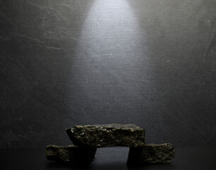 black stones on dark gray background for product presentation podium background.