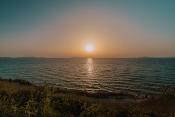 Idyllic seascape seen from mountain during sunset