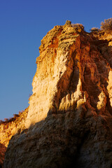 Cliffs in the evening light by Lagos, Algarve.