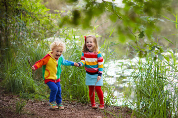 Kids play in autumn park