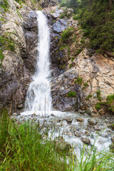 Obraz premium Waterfall in Barskoon gorge, Kyrgyzstan