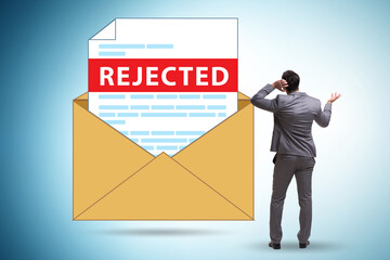 Man receiving rejection notice on his cv