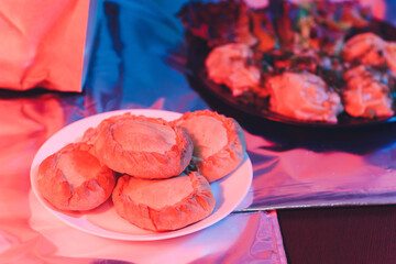 Traditional russian chicken pie kurnik on a plate laying on a table napkin, top view, horizontal. © Евгений Вершинин