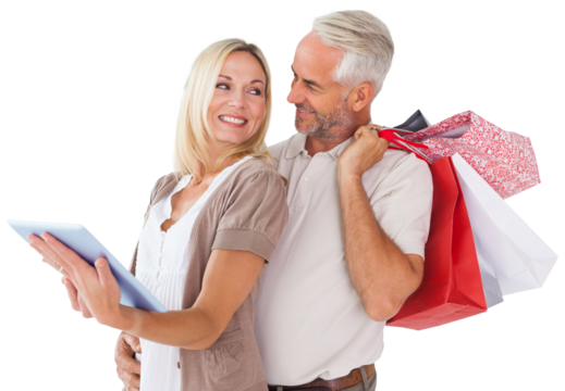 Digital png photo of caucasian couple with tablet and shopping bags on transparent background
