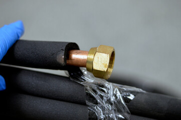 Air conditioning copper pipes tubes covered with black rubber, copper tubing  is most often used...