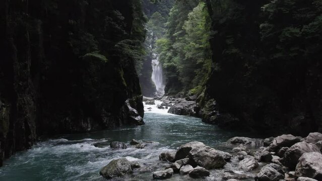 Waterfall and river in the mountain in Odaicho, Mie Japan by drone