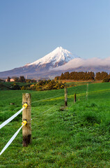 Mountain and fenced farmland