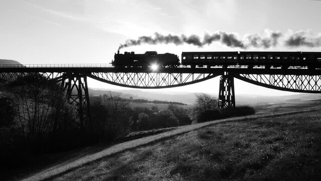 Industrial Steam Engine Locomotive Train Crossing Railroad Tracks