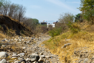 River degradation near of houses, Jalisco