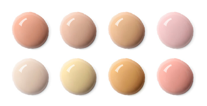 Liquid foundation of various shades for different skin tones isolated on white, top view. Set of samples