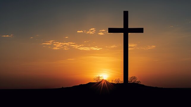 Image of a solitary cross religious symbol silhouetted against a glowing sunset sky.