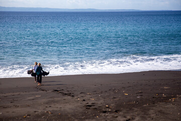 Two villagers getting water for salt