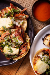 Tacos al pastor. Also known as Tacos de Trompo, they are the most popular type of street tacos in Mexico, commonly made with pork and beef marinated with achiote.
