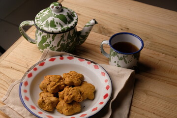 Kue Jahe Jadul, Star-shaped gingerbread cookies on a cooling rack. Pekalongan's typical ginger cake. Indonesian food. Cookies Jahe.