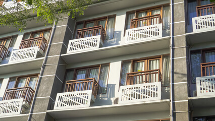 Many hotel balcony with glass door. Apartment balcony with glass window.