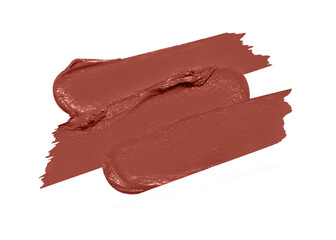 Caramel Color Pure Matte Lipstick smear smudge swatch isolated on white background. lip product brushstrokes. Smudged makeup cosmetics or paint texture