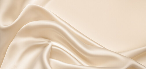 Soft pastel beige cream color, shiny satin silk swirl wave background banner - Abstract textile...