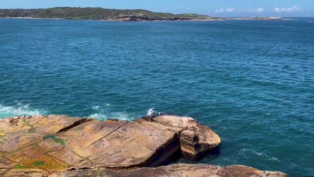 HD Video-Panoramic ocean views panning from high sea cliffs at Cape Solander in Kurnell, Kamay National Park, at the entry to Botany Bay in Sydney Metropolitan area in NSW, Australia.