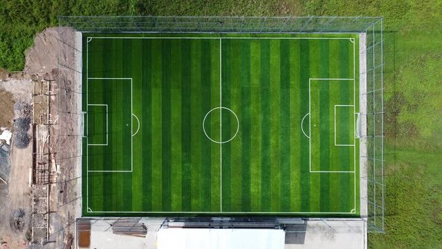 Aerial view of the futsal field with an open roof which is still quiet, no visitors have yet come
