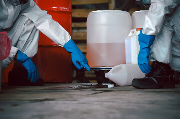 Specialist Officers in Chemical Safety Wear Chemical Risk Protective Clothing, Investigating and...