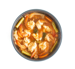 Top view of sour soup made of tamarind paste with shrimps and vegetable ,Thai food
