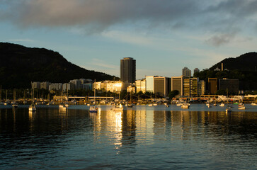 Skyline of Botafogo District Reflected on Water During Sunrise in Rio de Janeiro City