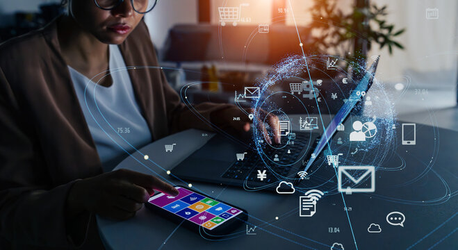 Communication network concept with black woman working in the office. IoT (Internet of Things). Mobile app.