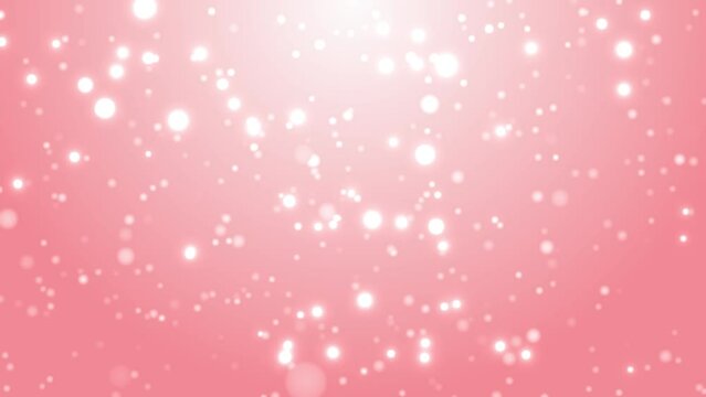 4K animation of rotating and dancing glittering circular particles ( pink )