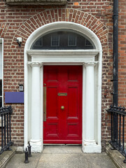 Fototapeta na wymiar A famous red painted Georgian door in Dublin, Ireland