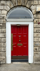 Fototapeta na wymiar A famous red painted Georgian door in Dublin, Ireland