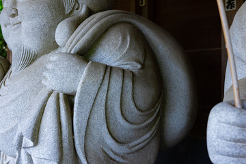 A Japanese guardian statue at the traditional street in Tokyo