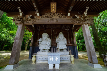 Japanese guardian statues at the traditional street in Tokyo wide shot