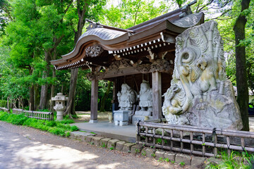 Japanese guardian statues at the traditional street in Tokyo wide shot