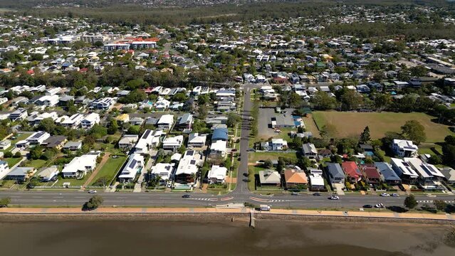 Aerial view moving left to right, of Sandgate and Brighton  waterfront on a sunny day, Brisbane, Queensland, Australia