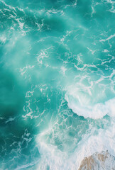 Turquoise sea waves at the tropical beach, directly above view, drone point of view