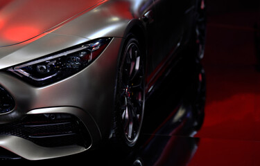 Front headlights of sport car on black background,copy space	