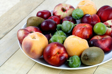 Tray with colorful and varied summer fruit