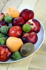 Tray with colorful and varied summer fruit
