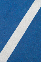 Fototapeta na wymiar Blue running track background and texture.