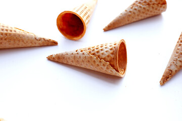 Empty ice cream cone on white background.